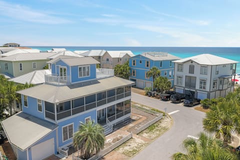 Aerial view showcasing the coastal neighborhood, ocean views, and easy beach proximity.