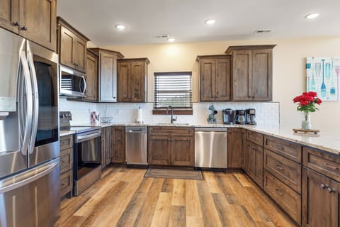 Huge kitchen with 2 dishwashers, fridge, and oven!