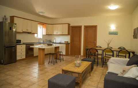 Kitchen Space – Bright and functional with traditional touches and natural materials.