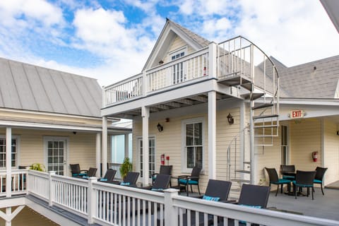 View the pool and sundeck from your private treetop balcony