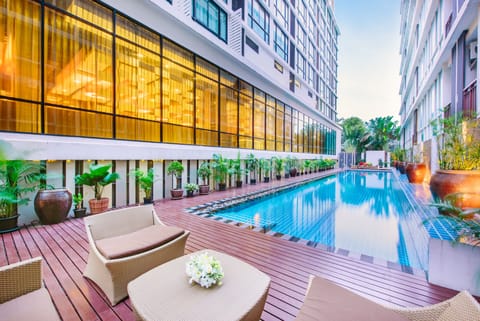Outdoor pool, open 9:00 AM to 7:00 PM, pool umbrellas, sun loungers