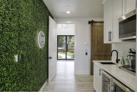 Cobboo's Beach House instagram wall and kitchenette