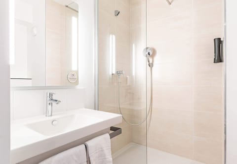 Shower, towels, soap, shampoo