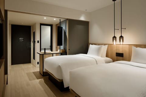 Standard Room, 2 Twin Beds | Down comforters, in-room safe, desk, blackout drapes
