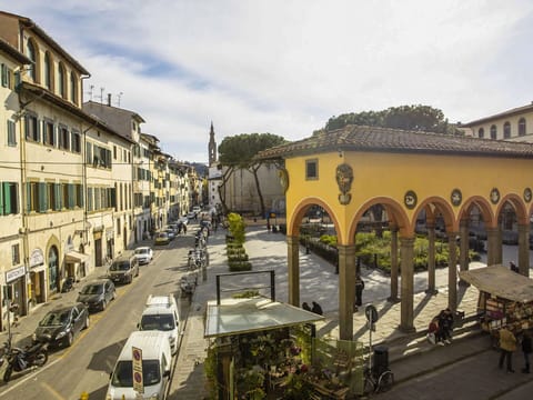 Town, City, Building, Human Settlement, Public Space, Town Square, Architecture, Yellow, Mixed-Use, Urban Area