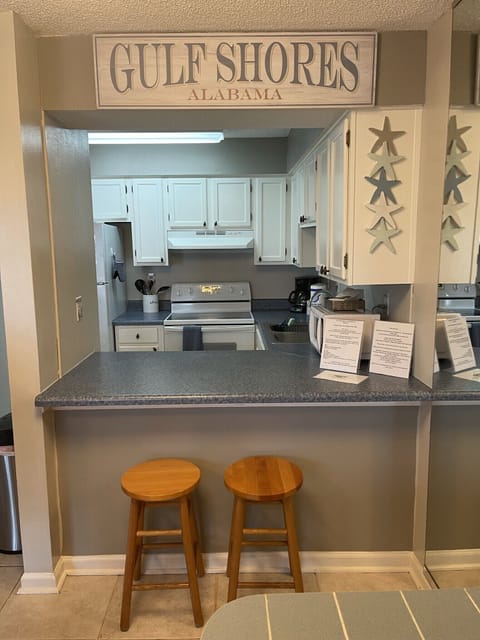 The kitchen and bar area