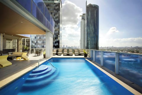 Outdoor pool, pool umbrellas, sun loungers