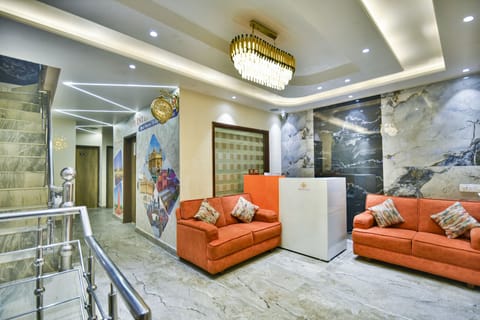 Deluxe Room | Living area | LCD TV, fireplace, printers