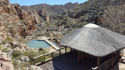 2 outdoor pools, a natural pool, pool umbrellas, sun loungers