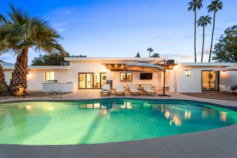 Relax and soak up the Arizona sun by the crystal-clear pool with stunning desert sky views.