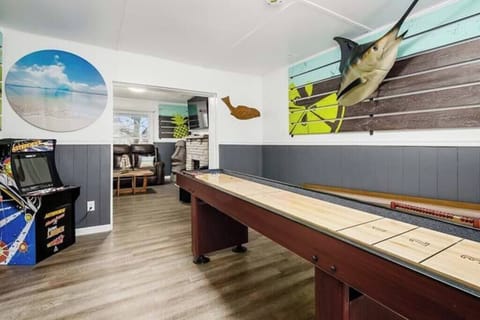First floor gaming room includes Skeeball, shuffleboard, arcade games and board games.