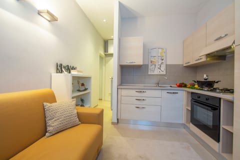 Family Villa, Multiple Bedrooms (Villa Lucia Laglio) | Private kitchen | Full-size fridge, microwave, oven, stovetop