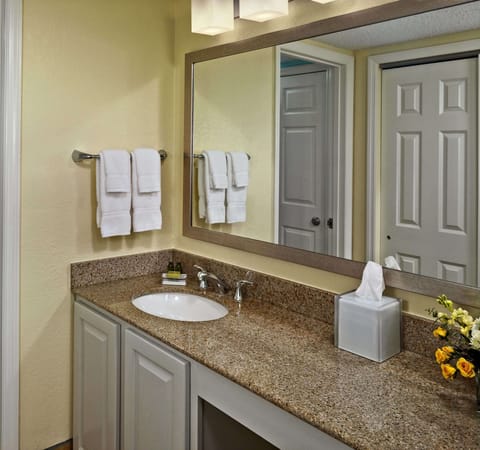 One Bedroom Suite, 2 Queens | Bathroom | Separate tub and shower, free toiletries, hair dryer, towels
