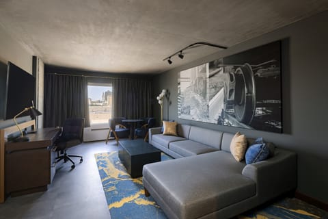 Signature Suite | Living area | 65-inch LED TV with cable channels