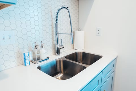 Double stainless sink with luxury faucet