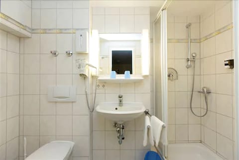 Shower, free toiletries, hair dryer, towels