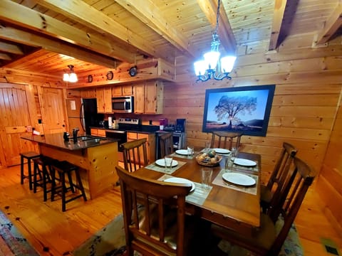 Kitchen and dining area with service for 6 plus island seating