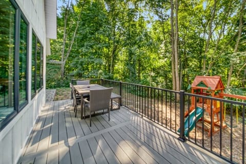 Outdoor deck with dining (off the main floor kitchen/living room)