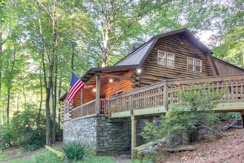 Authentic log cabin with relaxing front porch and plenty of privacy.
