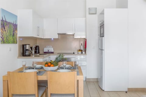 Bright kitchen with a welcoming island, ready for your favorite recipes.