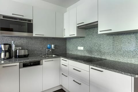 A fully-equipped kitchenette perfect for crafting meals with ease.