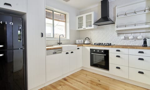 Modern Kitchen with full amenities.