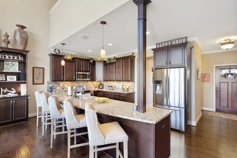 Gourmet kitchen, lots of granite counter space and expansive views.