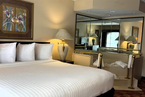 Executive Suite, 1 King Bed, Non Smoking, Jetted Tub (2 Rooms) | Hypo-allergenic bedding, individually decorated, individually furnished