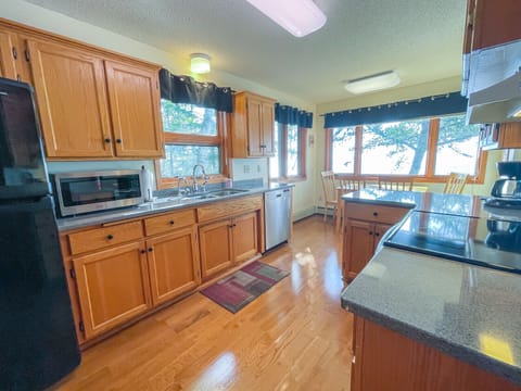 Kitchen view towards lake. 