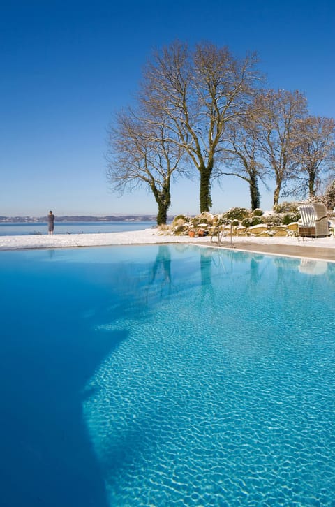 Indoor pool, outdoor pool, pool umbrellas, sun loungers