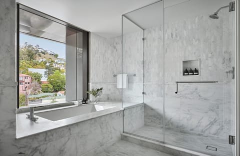 Premium bedding, down comforters, pillowtop beds, minibar