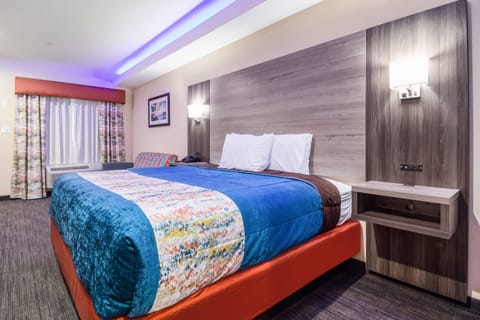 Pillowtop beds, desk, blackout drapes, iron/ironing board