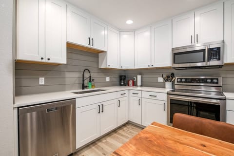 Modern functionality meets classic cabin style in our well-appointed kitchen.