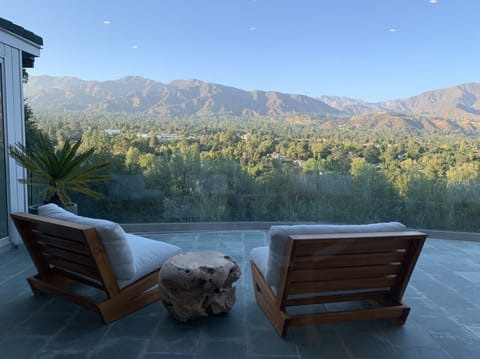 Looking at la Canada at birds eye off balcony with Teak wood furniture