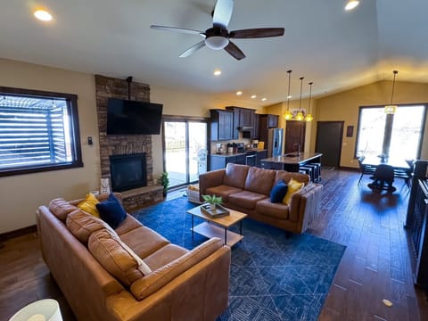 Very open layout with living, kitchen, and dining flowing together for the perfect entertaining area. Access to backyard and patios off both sides of the kitchen allow for indoor/outdoor entertaining fun!