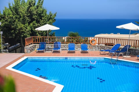 Seasonal outdoor pool, pool umbrellas, sun loungers