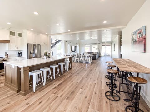 Spacious open-concept kitchen and dining area, perfect for hosting meals and making memories together.