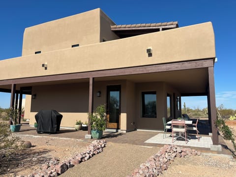 Wrap around porch with new grill, comfortable seating, and great views