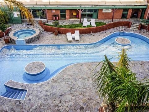 Outdoor pool, open 8:00 AM to 8:00 PM, sun loungers