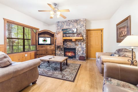 The Living Room features a Seasonal Gas Fireplace, Cable TV/DVD, and a Sofa Bed
