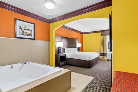 Suite, 1 King Bed, Non Smoking | In-room safe, desk, laptop workspace, iron/ironing board
