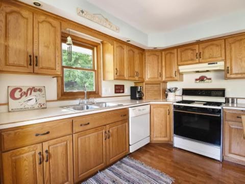 Kitchen stocked with all dishes, pans, bakeware, etc.