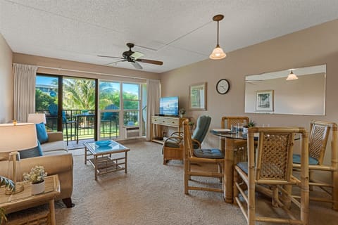 Picture yourself unwinding in this bright, airy space with tropical breezes drifting through your private balcony. Palm-fringed views and comfortable island-style furnishings create your perfect Hawaiian retreat.