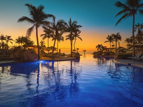 6 outdoor pools, cabanas (surcharge), pool umbrellas