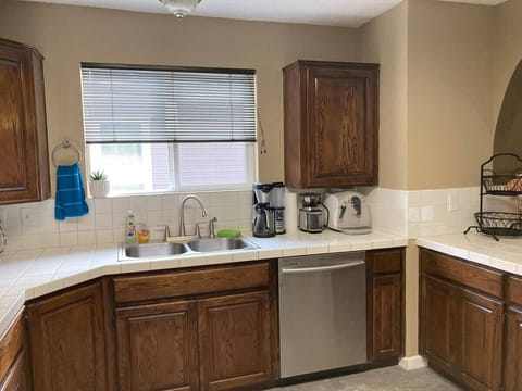 kitchen with dishwasher and espresso machine