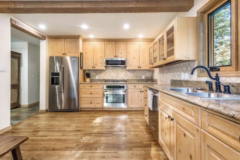 Gorgeous granite countertops provide plenty of workspace for the chef.