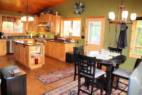 A fully-equipped Kitchen and Dining Area.
