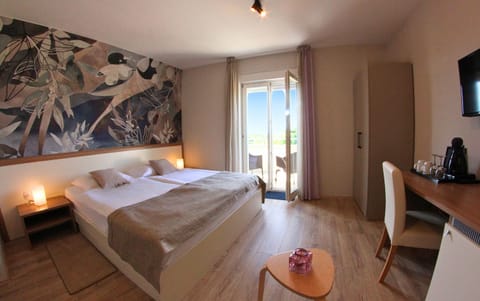 Classic Double Room, 1 King Bed, Balcony, Partial Sea View | In-room safe, desk, free WiFi, bed sheets