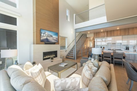 Soaring fireplace and comfortable seating