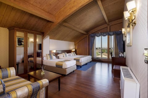 Down comforters, minibar, in-room safe, desk